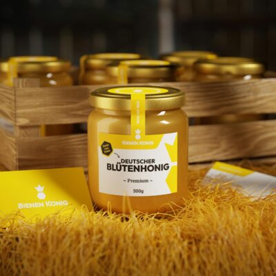 A Glass of Honey Beside a Wooden Tray